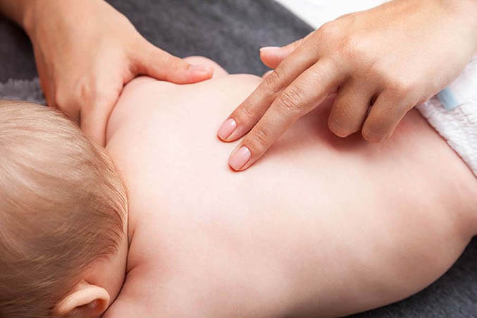 7-12 months; Osteopath; adjustment; alternative; baby; back; bone; chest; child; chiropractic; chiropractor; doctor; finger; girl; hand; healing; health; infant; manipulate; manipulation; manual; massage; massaging; masseuse; medical; osteopathy; patient; physical; physician; physiotherapist; physiotherapy; pseudomedicine; rehabilitation; spine; therapist; therapy; treatment; woman